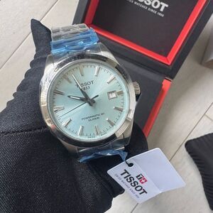 NIB ICE BLUE POWERMATIC 80 SILICIUM
TISSOT WATCH